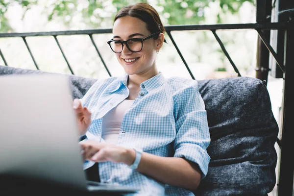 Cheerful Adult Relaxed Female Glasses Casual Clothes Concentrating Screen Interacting — Stock Photo, Image