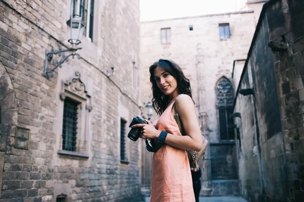 Attractive Smiling Lady Peach Clothes Digital Camera Standing Street Stone — Stock Photo, Image