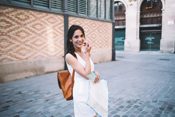 Optimistic Female Tourist Paper Map Smiling Looking Camera While Standing — Stock Photo, Image