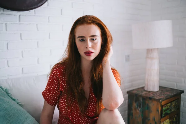 Tranquil Confident Red Haired Woman Red Polka Dot Dress Sitting — Stock Photo, Image