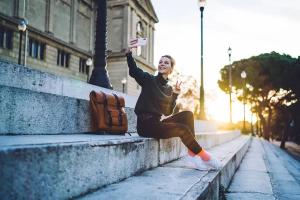 Delighted Adult Female Warm Casual Outfit Sitting Backpack Street Stairs — Stock Photo, Image