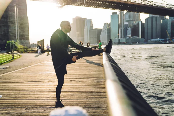 Side View Man Doing Leg Hamstring Stretch Leaning Fence City — Stock Photo, Image