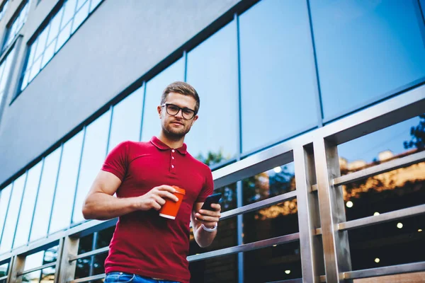 Handsome Caucasian Male Millennial Eyewear Holding Mobile Phone Walking Street — Stock Photo, Image