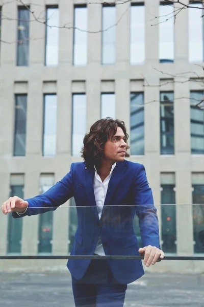 Successful business man standing near office — Stock Photo, Image