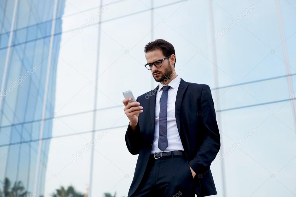 businessman pensive texting