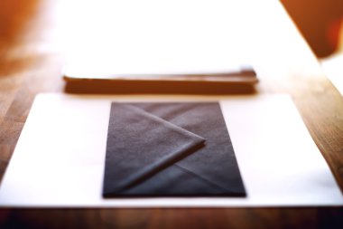 Black envelope and digital tablet clipart