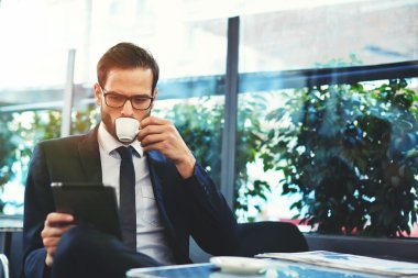 Handsome successful man drink coffee