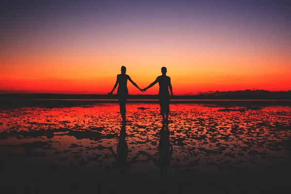 https://st2.depositphotos.com/3396639/6920/i/450/depositphotos_69200221-stock-photo-couple-in-love-holding-hands.jpg