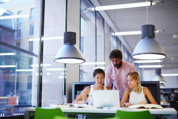 University students learning in library