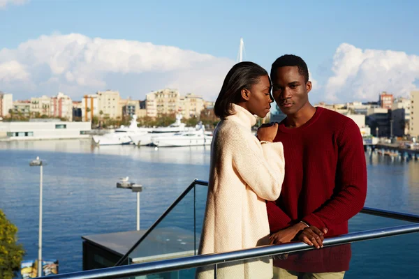 Couple hugging on modern balcony — Stock Photo, Image