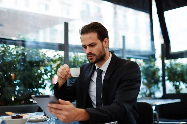 Businessman having a breakfast — Stock Photo, Image