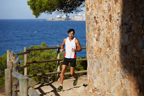 Männlicher Sportler joggt im Freien — Stockfoto