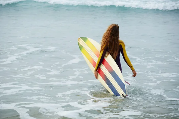 Young woman in wetsuit — Stock Photo, Image