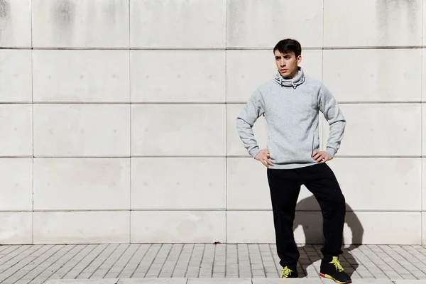 Young athletic man in sportswear — Stock Photo, Image