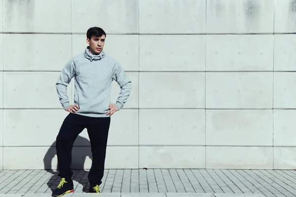 Young athletic man in sportswear — Stock Photo, Image