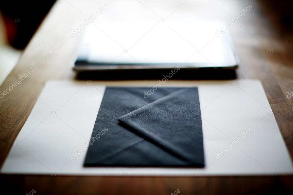 Black envelope and digital tablet