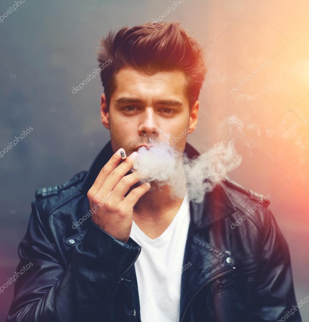 Man Exhaling Cigarette Smoke Stock Photo Gaudilab 69203097 Square Size Portrait Of Handsome Man Exhaling Cigarette Smoke Looking To The Trendy Attractive Ing Out His Mouth Standing On Grey