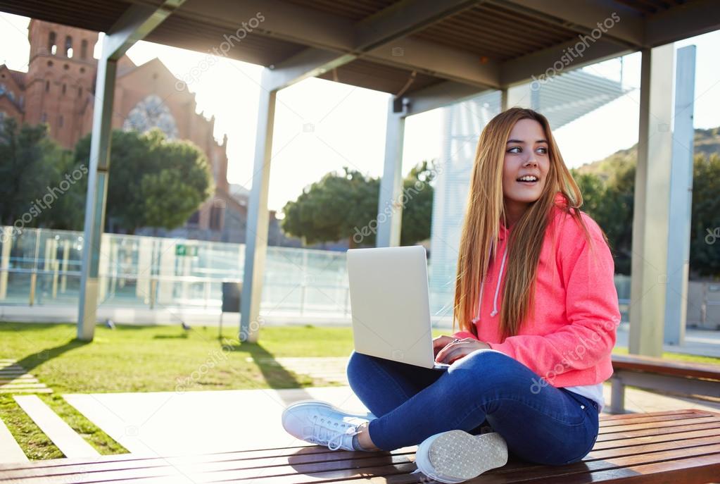 Female student looking away for someone