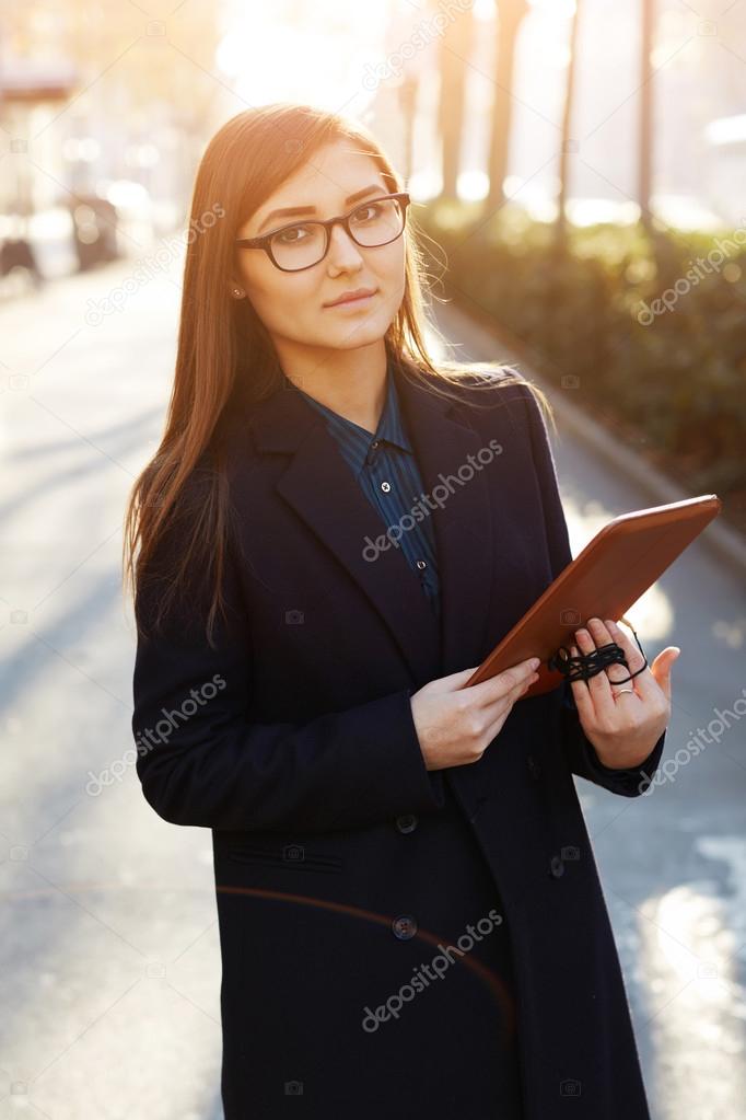 Female student standing outdoors