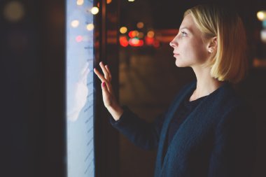 businesswoman touching sensitive screen