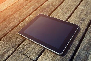 Black digital tablet with blank screen