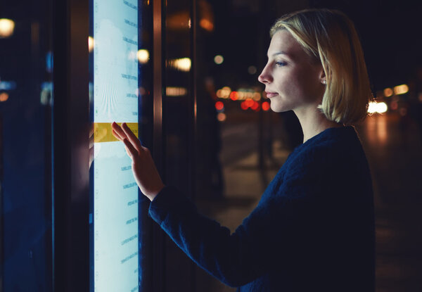 woman touching sensitive screen