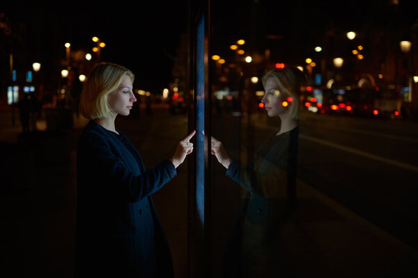 woman consults on modern big timetable