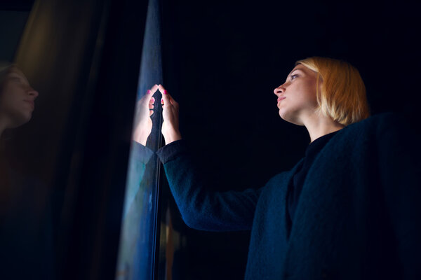 businesswoman touching sensitive screen