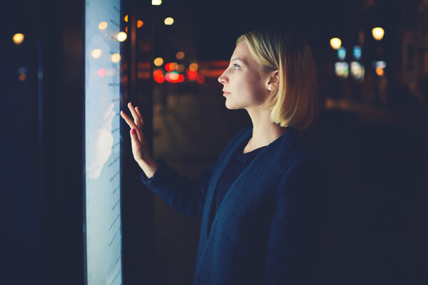 businesswoman touching sensitive screen