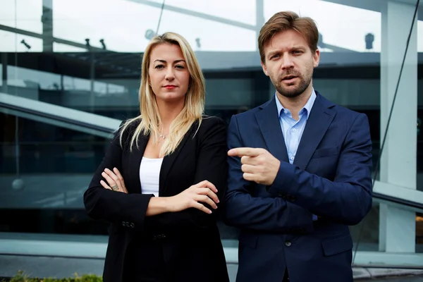 Business colleagues standing near office building — Stock Photo, Image