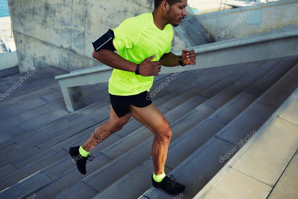 Man running up stairs — Stock Photo © GaudiLab 73328933