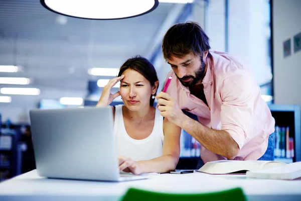 Asian businesswoman getting advice Royalty Free Stock Images