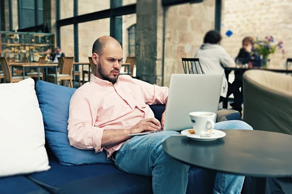 Businessman looking at financial data — Stock Photo, Image