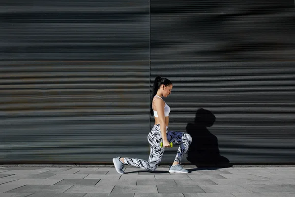 Woman working out with dumbbells