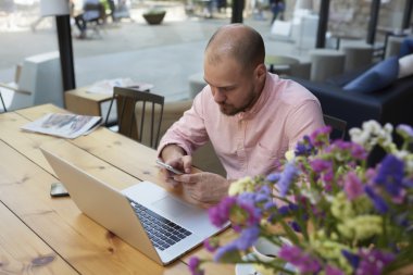 businessman at coffee break text messaging