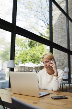 woman having cell phone conversation