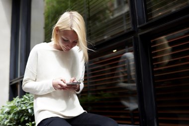 woman focused chatting or talk on smartphone