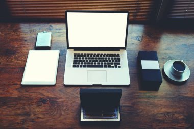 Freelancer needs workstation with accessories and cup of coffee