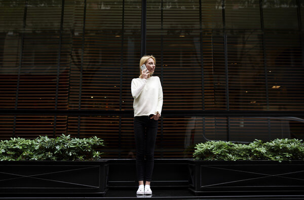 female hipster have smartphone conversation