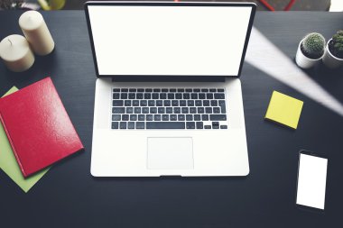 Modern office on the table is a notebook