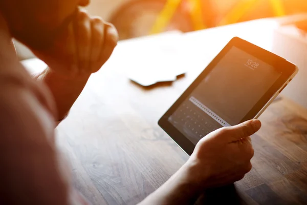 Entrepreneur or freelancer work on touchscreen pad at the office