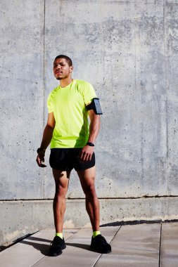 Young athlete having a rest after workout