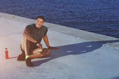 sportsman taking break after workout