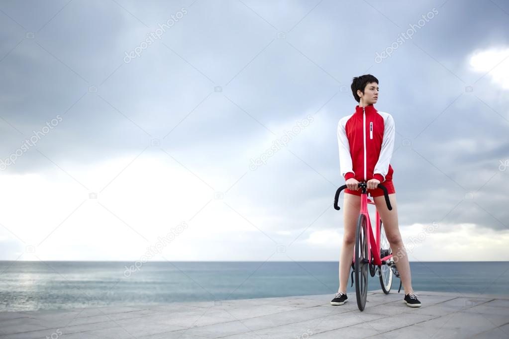 female cyclist resting after ride