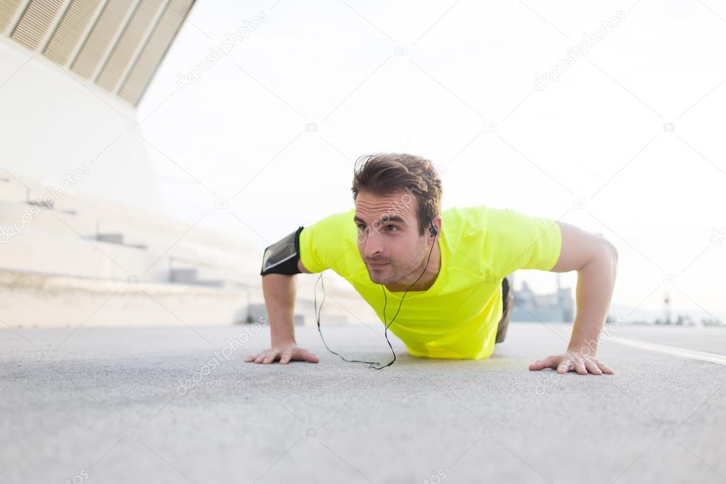 Male athlete doing exercises