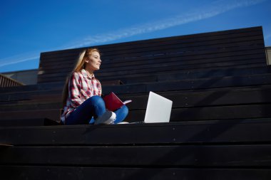 female student learning using laptop