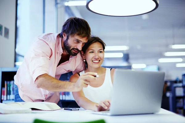 Freelancer helping his colleague working online