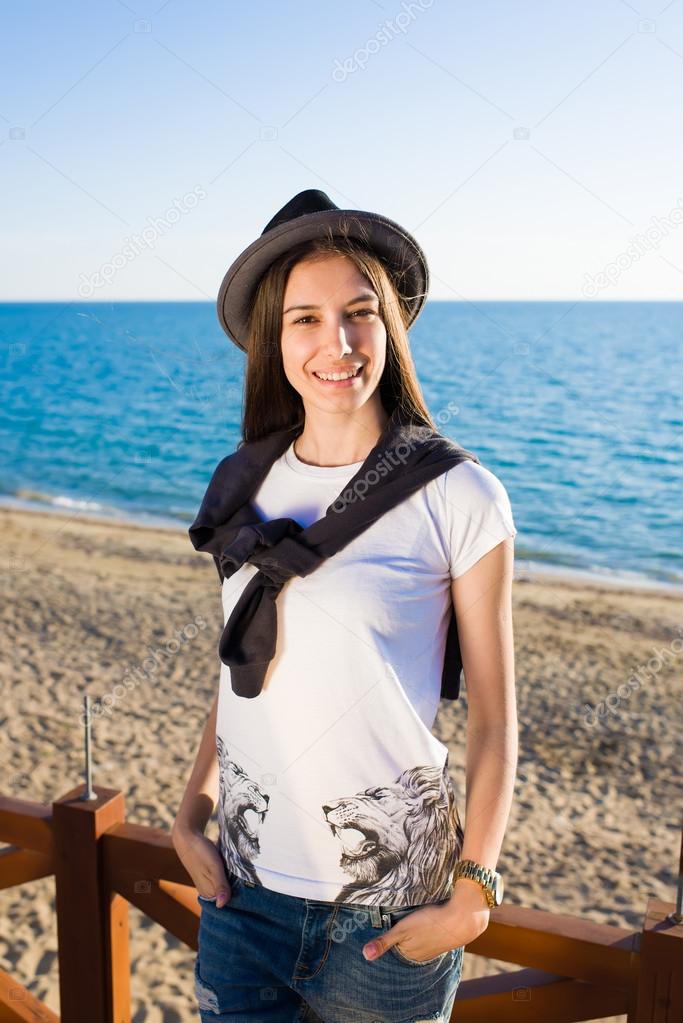 Fashionable attractive model on the beach