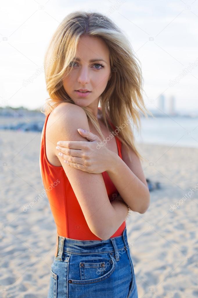 Beautiful caucasian model posing on the beach