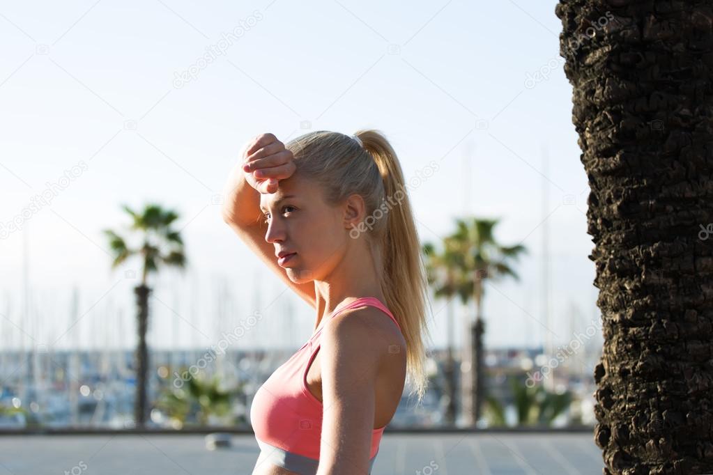 Caucasian female exercising outdoors